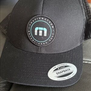 Travis Mathew Black and Blue Logo Snapback